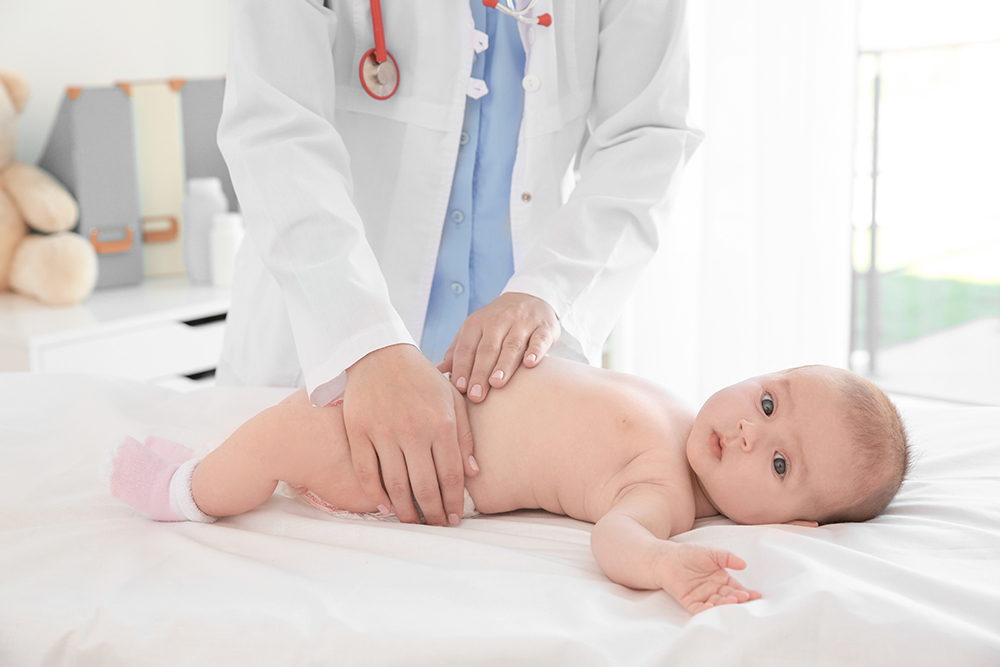 A child being examined by a physician