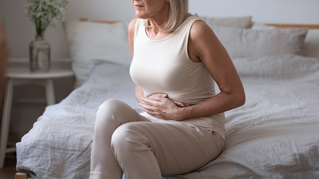 Person holding stomach