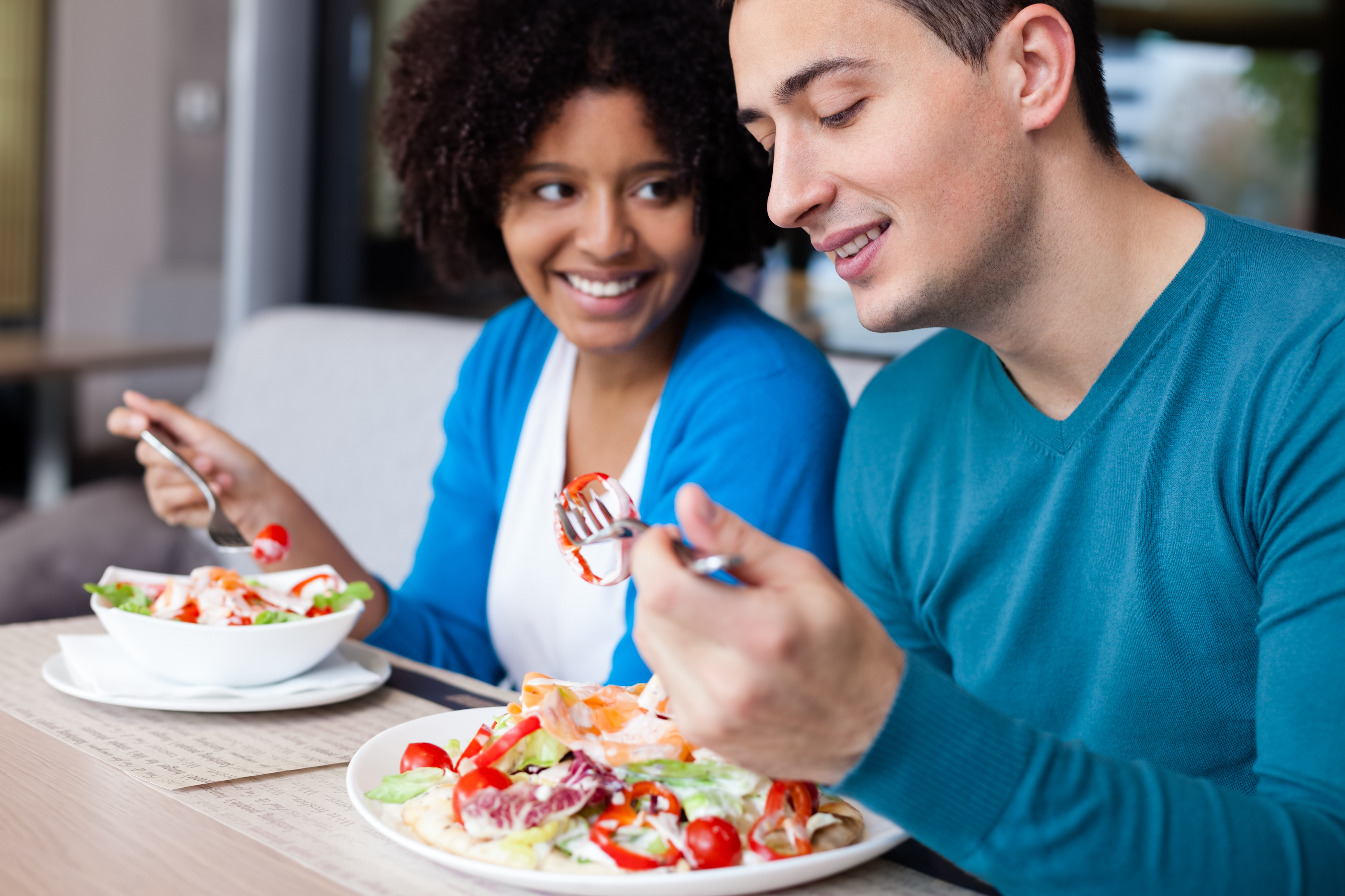 two people eating a healthy meal