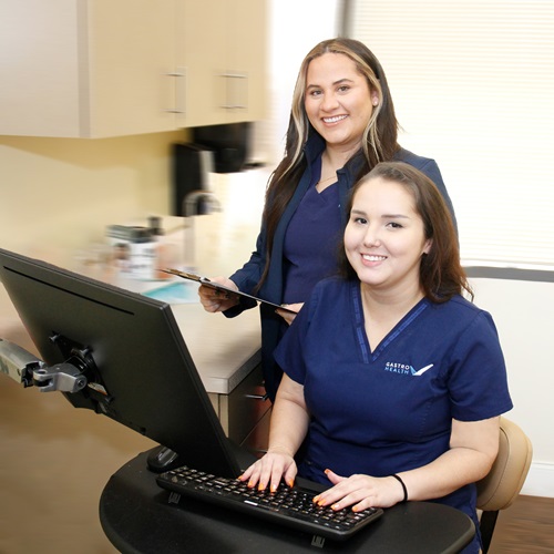 two medical assistants working together