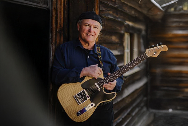 Bill poses with guitar