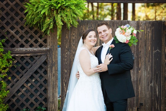 Emily Vest and husband on their wedding day