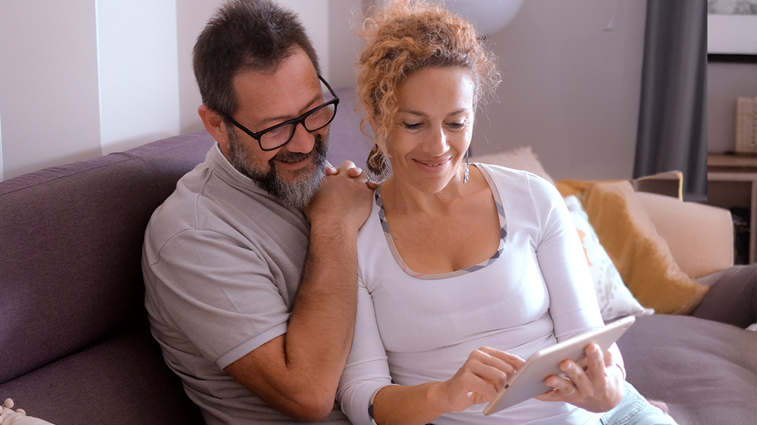 Couple watching webinar