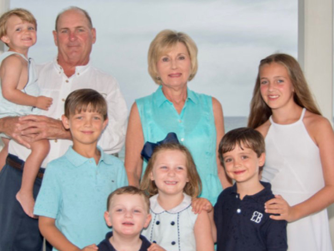 Susan Brunson with her husband and grandchildren